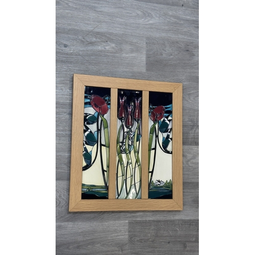 266 - A framed Moorcroft Blackwell pattern triptych wall plaque - approx. 49cm high x 43cm wide