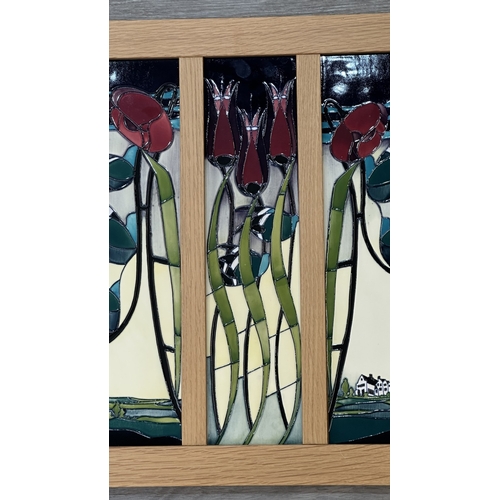 266 - A framed Moorcroft Blackwell pattern triptych wall plaque - approx. 49cm high x 43cm wide