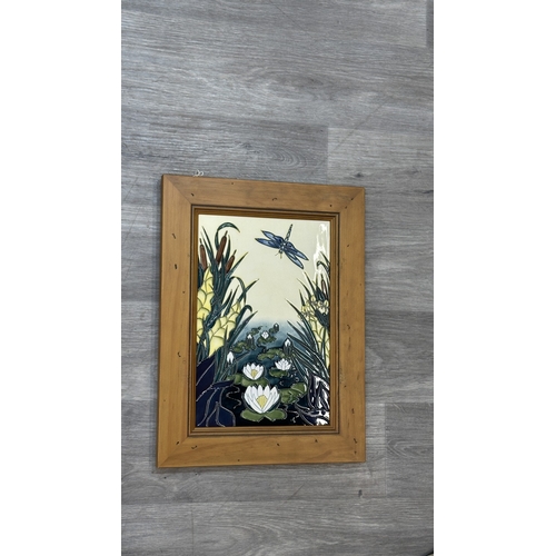 267 - A framed Moorcroft Lamia pattern wall plaque by Rachel Bishop - approx. 42cm high x 31cm wide