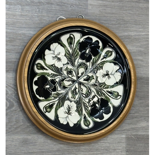 269 - A framed Moorcroft Harlequinade circular wall plate - approx. 30cm diameter
