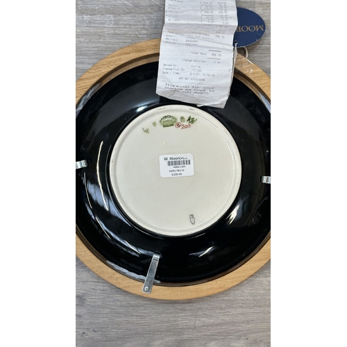 269 - A framed Moorcroft Harlequinade circular wall plate - approx. 30cm diameter