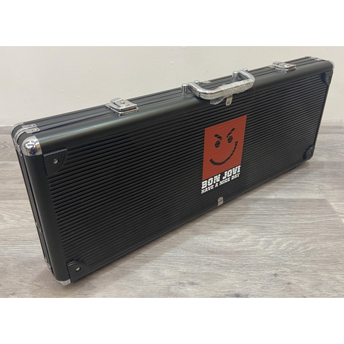 1 - A Bon Jovi signed guitar poker combo: a very special package numbered 12 of 20. Each package contain... 