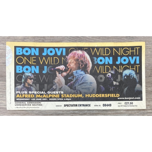102 - Two official Bon Jovi 'One Wild Night' 2001 tour programmes, two variants, together with a ticket fo... 