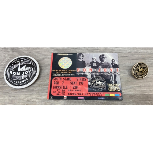 103 - An official Bon Jovi 'Bounce' 2003 UK tour programme together with two badges and a ticket for Manch... 