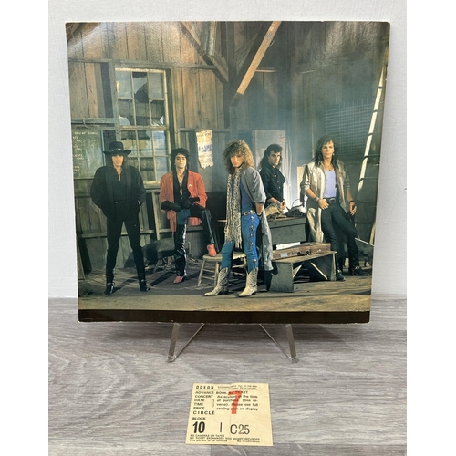 104 - An official Bon Jovi 'Slippery When Wet' 1986 tour programme together with an advance booking ticket... 