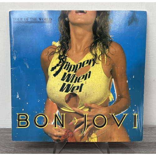 104 - An official Bon Jovi 'Slippery When Wet' 1986 tour programme together with an advance booking ticket... 
