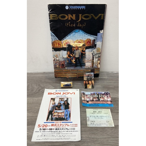 105 - Six items of memorabilia from Bon Jovi's These Days Tour 1996 European and Japan legs, to include an... 