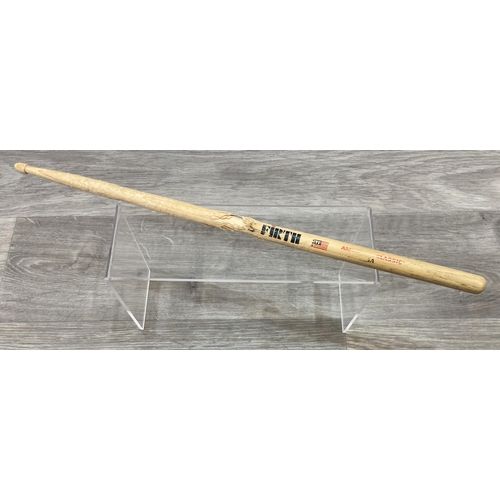 112 - A Vic Firth drumstick believed to have been used by Bon Jovi's Tico Torres during the Jersey Syndica... 