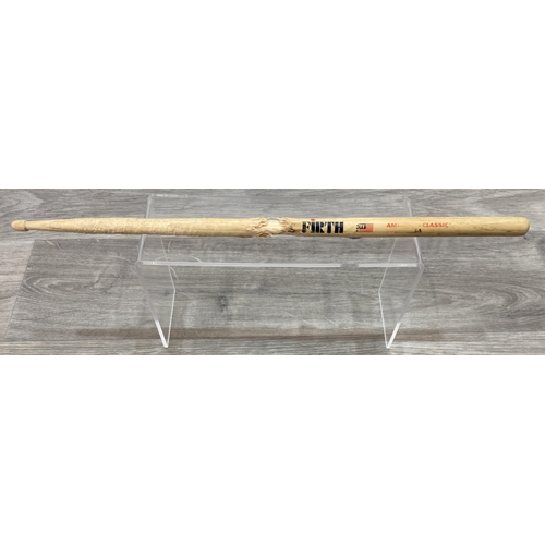 112 - A Vic Firth drumstick believed to have been used by Bon Jovi's Tico Torres during the Jersey Syndica... 