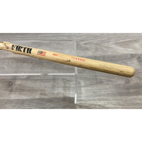 112 - A Vic Firth drumstick believed to have been used by Bon Jovi's Tico Torres during the Jersey Syndica... 