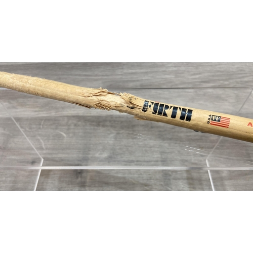 112 - A Vic Firth drumstick believed to have been used by Bon Jovi's Tico Torres during the Jersey Syndica... 