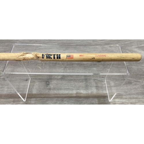 112 - A Vic Firth drumstick believed to have been used by Bon Jovi's Tico Torres during the Jersey Syndica... 