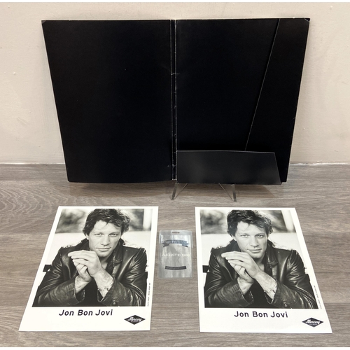 113 - A collection of Bon Jovi memorabilia, to include a backstage pass for Bon Jovi's 'New Jersey' press ... 