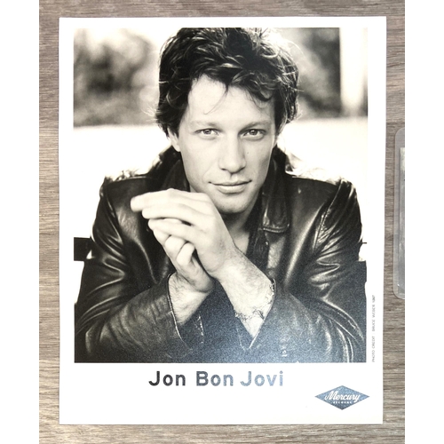 113 - A collection of Bon Jovi memorabilia, to include a backstage pass for Bon Jovi's 'New Jersey' press ... 