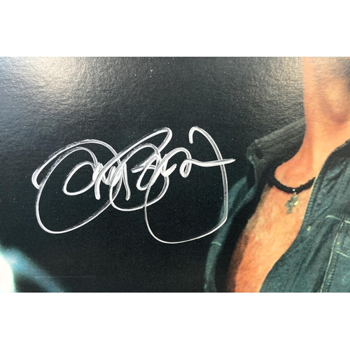 119 - A Jon Bon Jovi hand-signed colour 8 x 10 inch photograph, originally released as part of an exclusiv... 