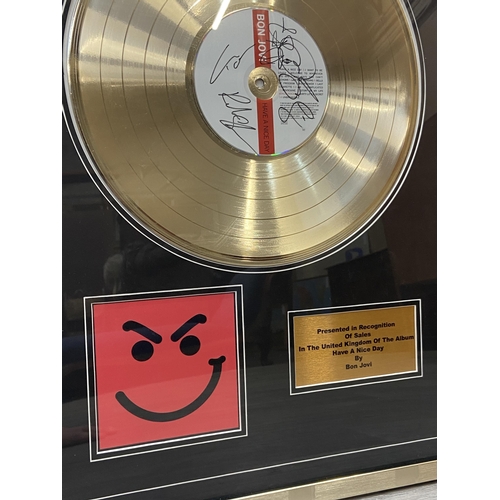 2 - A signed limited edition gold record presentation recognizing sales of the album 'Have A Nice Day' b... 