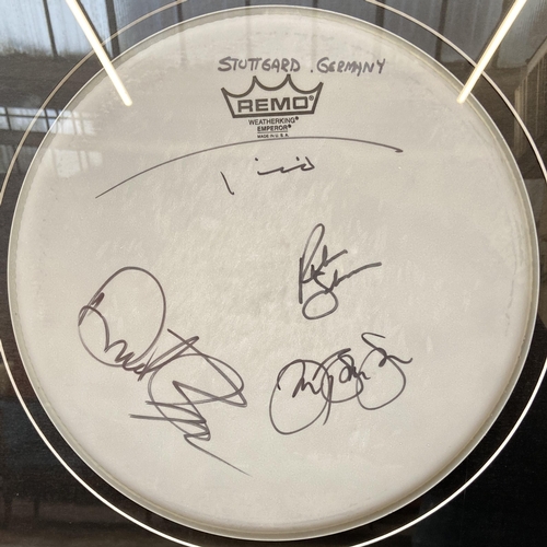 3 - A Bon Jovi framed memorabilia display featuring an official drumhead and drumstick used by Tico Torr... 