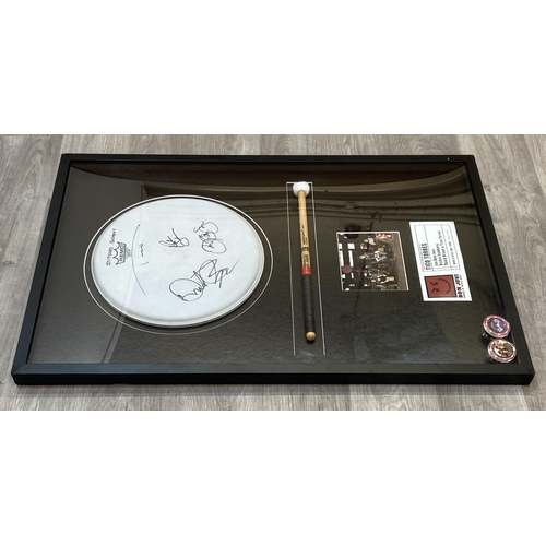 3 - A Bon Jovi framed memorabilia display featuring an official drumhead and drumstick used by Tico Torr... 