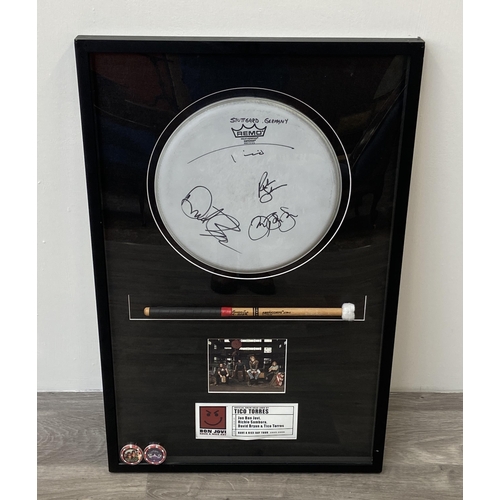 3 - A Bon Jovi framed memorabilia display featuring an official drumhead and drumstick used by Tico Torr... 
