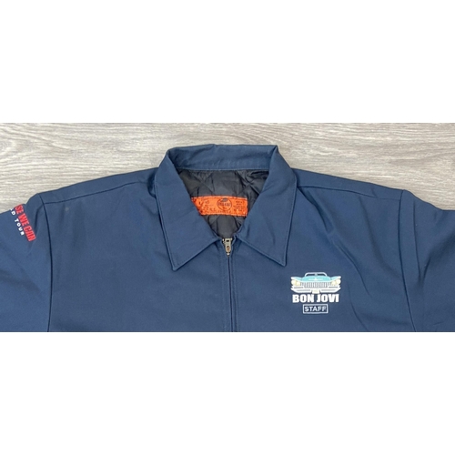 30 - Two items of staff workwear from Bon Jovi's Because We Can Tour in 2013: One navy blue jacket made b... 