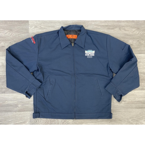 30 - Two items of staff workwear from Bon Jovi's Because We Can Tour in 2013: One navy blue jacket made b... 