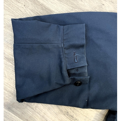 30 - Two items of staff workwear from Bon Jovi's Because We Can Tour in 2013: One navy blue jacket made b... 