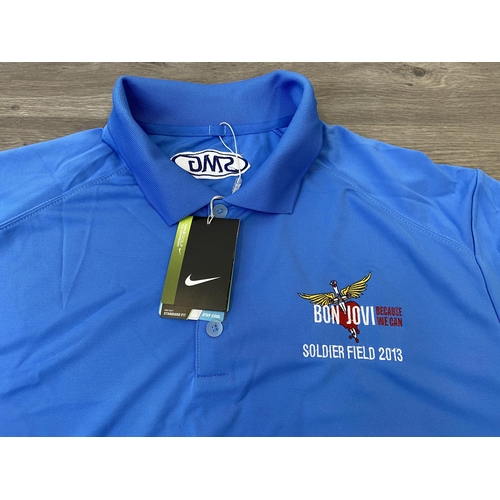 32 - Two items of staff workwear from Bon Jovi's Because We Can Tour in 2013: one Nike Dri-Fit blue polo ... 