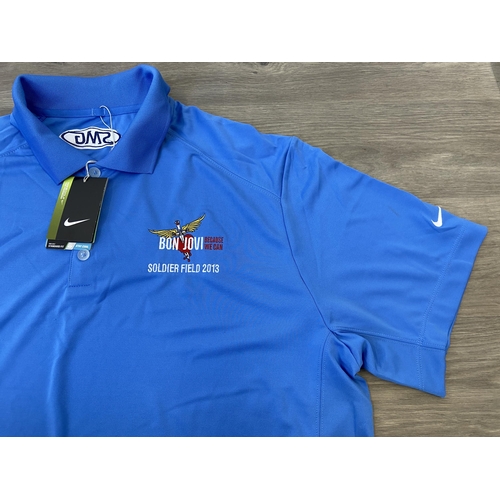 32 - Two items of staff workwear from Bon Jovi's Because We Can Tour in 2013: one Nike Dri-Fit blue polo ... 