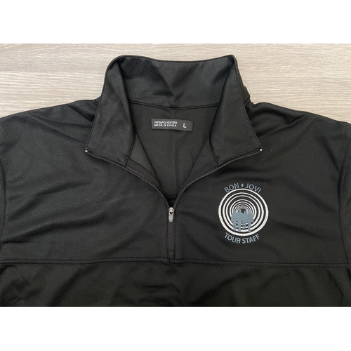 34 - Two items: one black Dickies short-sleeve work shirt featuring an embroidered Bon Jovi logo above th... 