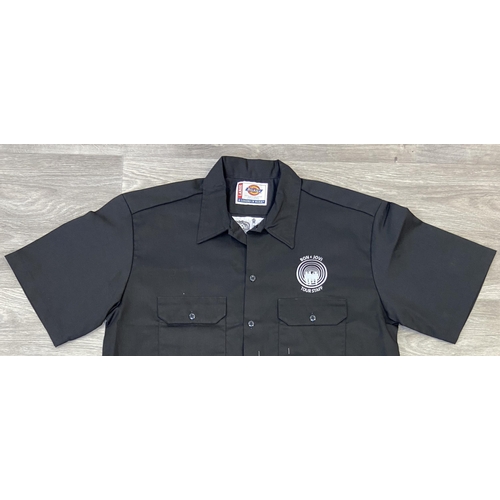34 - Two items: one black Dickies short-sleeve work shirt featuring an embroidered Bon Jovi logo above th... 