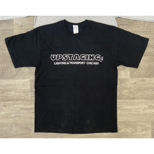 35 - Two items of staff workwear both feature a graphic for Upstaging Inc., a well-known lighting and sta... 