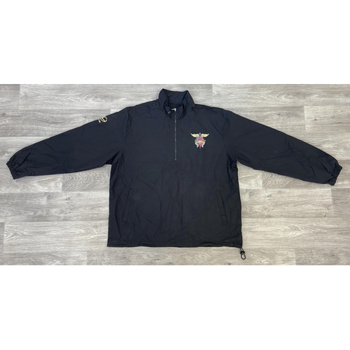 41 - A Bon Jovi windbreaker jacket by North End in black features an embroidered daggered heart with wing... 
