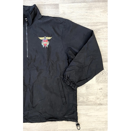 41 - A Bon Jovi windbreaker jacket by North End in black features an embroidered daggered heart with wing... 