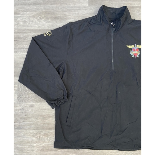 41 - A Bon Jovi windbreaker jacket by North End in black features an embroidered daggered heart with wing... 