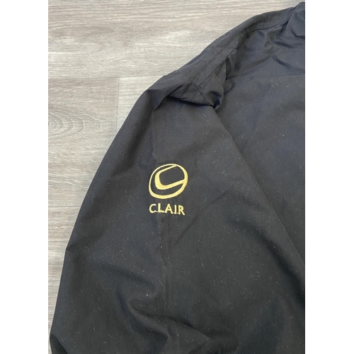 41 - A Bon Jovi windbreaker jacket by North End in black features an embroidered daggered heart with wing... 