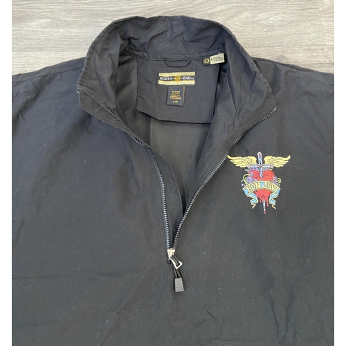 41 - A Bon Jovi windbreaker jacket by North End in black features an embroidered daggered heart with wing... 
