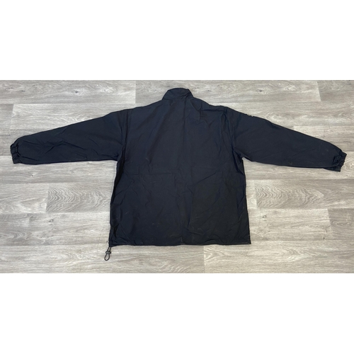 41 - A Bon Jovi windbreaker jacket by North End in black features an embroidered daggered heart with wing... 