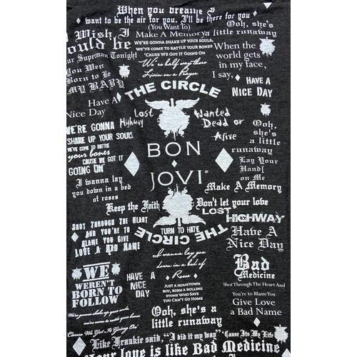 Two items: one brown Bon Jovi The Circle Tour t-shirt that