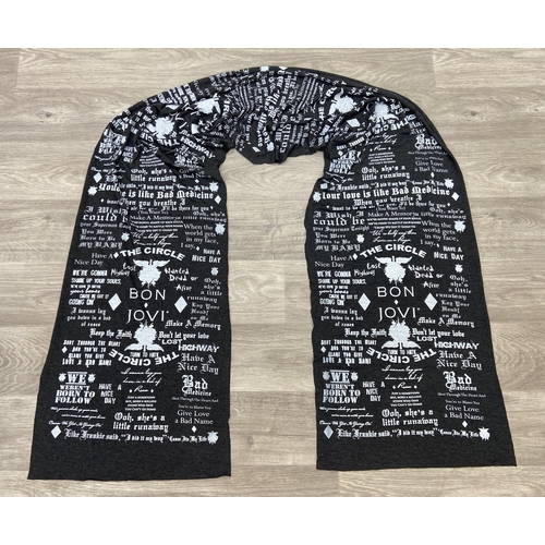 Two items: one brown Bon Jovi The Circle Tour t-shirt that