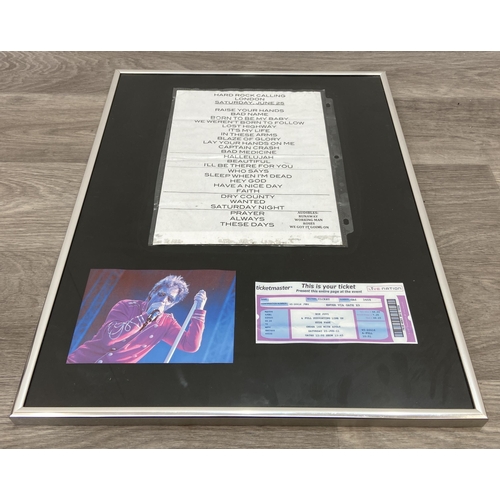 A Bon Jovi framed memorabilia display featuring the setlist and one ...