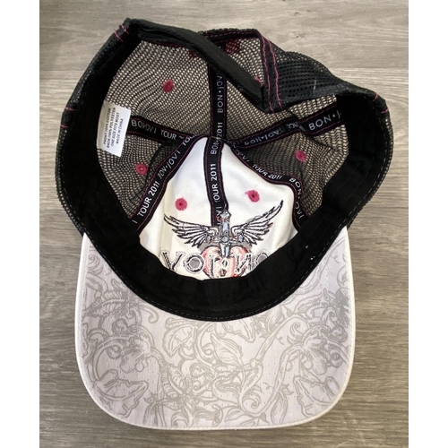 61 - Four baseball caps: one for Bon Jovi's The Circle Tour and three for Bon Jovi's 2011 Greatest Hits T... 