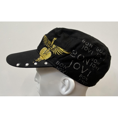 61 - Four baseball caps: one for Bon Jovi's The Circle Tour and three for Bon Jovi's 2011 Greatest Hits T... 