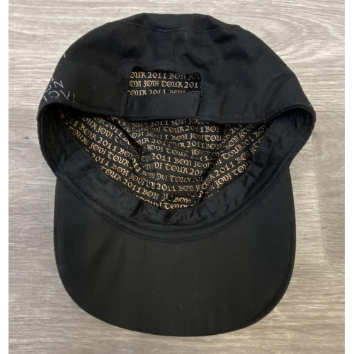 61 - Four baseball caps: one for Bon Jovi's The Circle Tour and three for Bon Jovi's 2011 Greatest Hits T... 