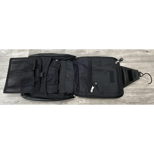 62 - Two Bon Jovi 'The Circle Tour' black leather hanging toiletry travel bags by Canyon Outback were onl... 