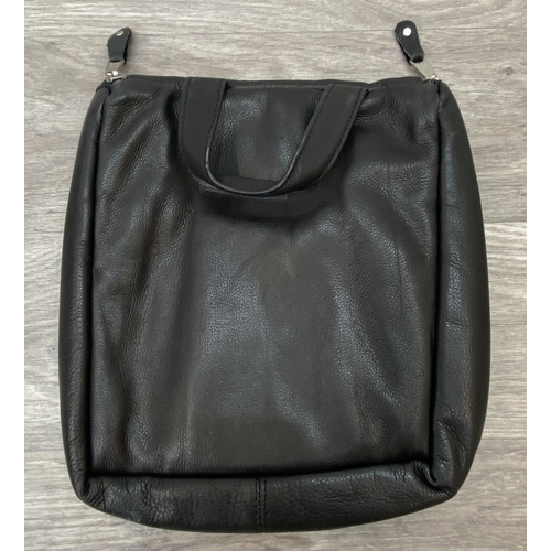 62 - Two Bon Jovi 'The Circle Tour' black leather hanging toiletry travel bags by Canyon Outback were onl... 