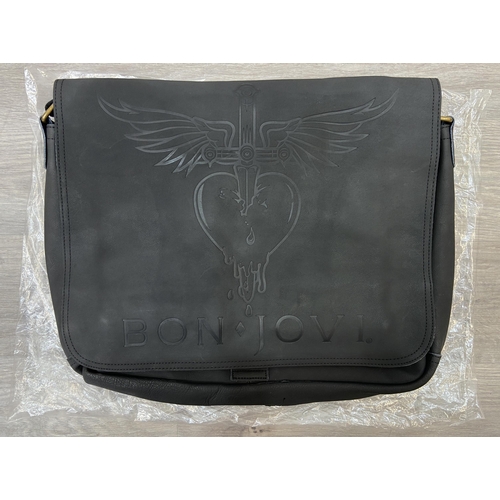 63 - A Bon Jovi 'The Circle Tour' black leather messenger bag was only given out to VIP ticket holders; i... 