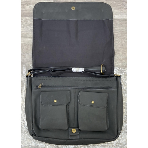 63 - A Bon Jovi 'The Circle Tour' black leather messenger bag was only given out to VIP ticket holders; i... 
