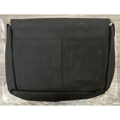 63 - A Bon Jovi 'The Circle Tour' black leather messenger bag was only given out to VIP ticket holders; i... 