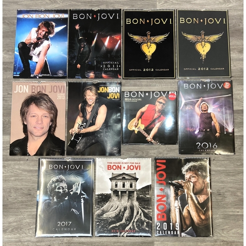 67 - Eleven Bon Jovi calendars from various years, including 2010, 2011, 2012, 2013, 2014, 2016, 2017, 20... 