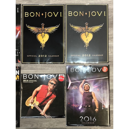 67 - Eleven Bon Jovi calendars from various years, including 2010, 2011, 2012, 2013, 2014, 2016, 2017, 20... 